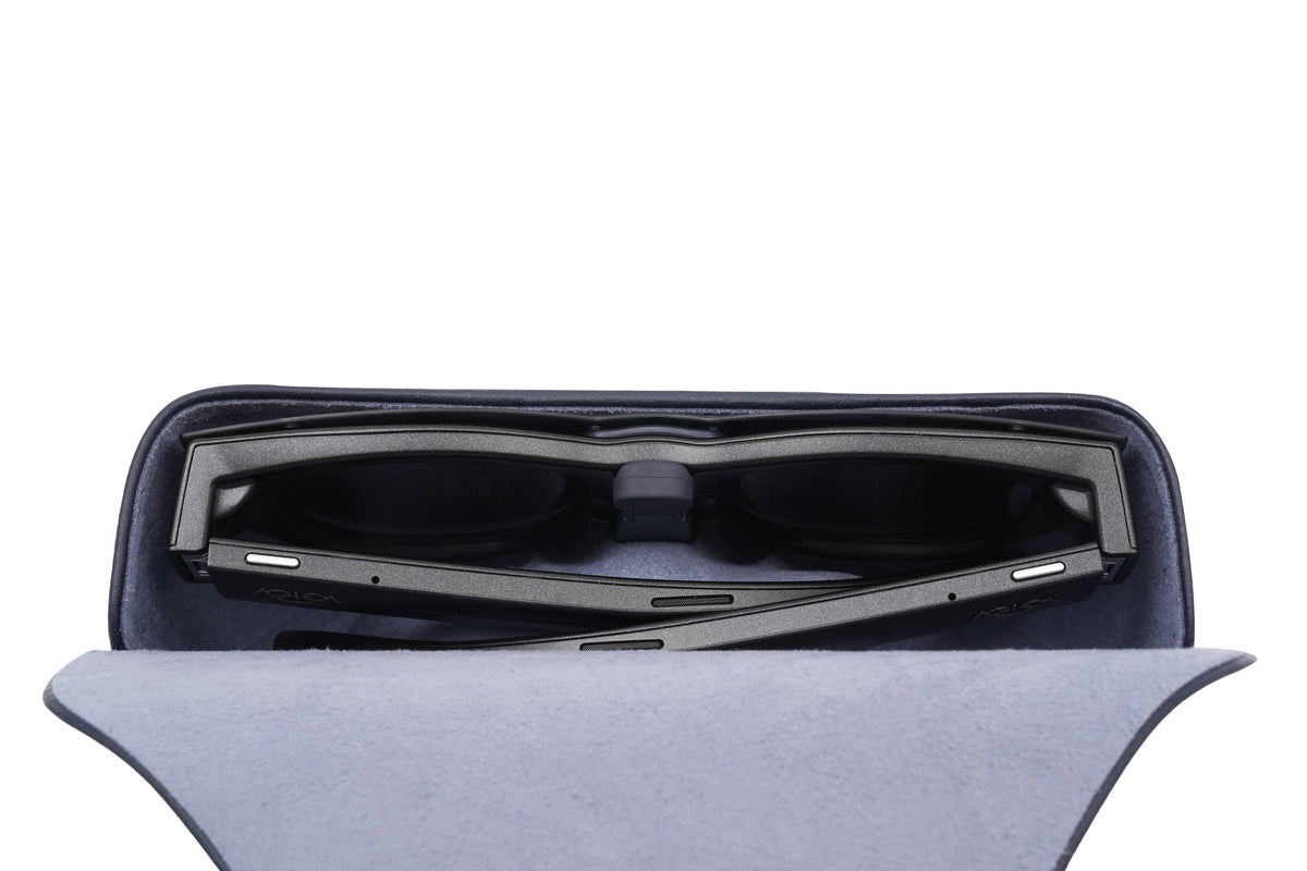 A look inside the charging case, featuring a dedicated compartment for the sunglasses clip-on